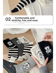 Detailed view of cotton crew socks with cute flocked bear embroidery and striped patterns