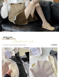 Detailed view of ribbed cotton knee-high socks in various earth tones and soft textures