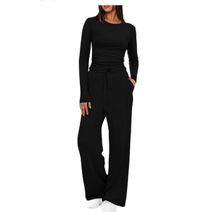 Women's black two-piece casual set with long sleeve top and high-waisted wide leg pants