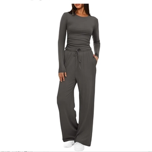 Women's dark grey lounge set with slim fit long sleeve top and wide leg drawstring pants