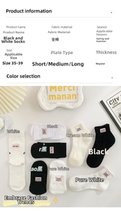 Dettagli di calzini in cotone assortiti in bianco e nero con accenti ricamati