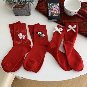 Red cotton crew socks with festive embroidery and plush bows for Lunar New Year