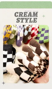 Close-up of thick checkered wool socks with various color patterns and soft knit texture