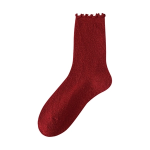 Women's deep red wool blend socks with ruffled edges and vertical ribbed knit texture
