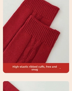 Detail of red cable knit socks featuring high-elastic ribbed cuffs for winter