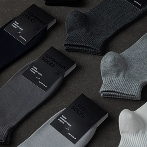 Men's cotton athletic socks set in classic neutral colors with ribbed cuffs for comfort
