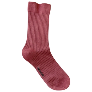 Pink cotton slouch socks with ribbed knit pattern and elastic cuff on white background