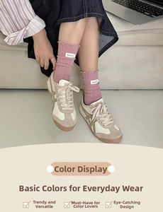 Close-up of pink ruffle trim socks with white label paired with retro sneakers