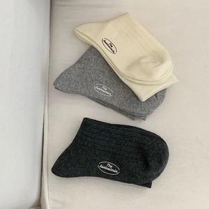 Three-pack cotton crew socks in black grey and cream with vertical rib and logo