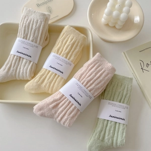 Cozy women's cable knit mid-calf socks in soft pastel morandi colors for autumn winter