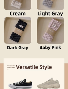 Close-up of ribbed cotton crew socks in cream, grey, and pink with woven brand labels