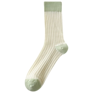 Women's cream knit crew socks with light green contrast heel and toe patches
