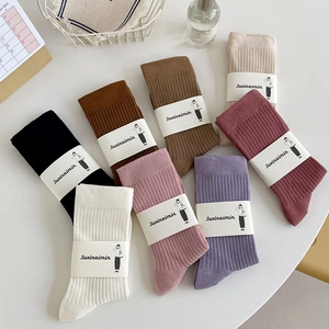 Cotton knitted slouch socks set in various colors with textured vertical stripe design