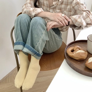 Casual cream ribbed crew socks for women featuring minimalist Japanese style knit texture