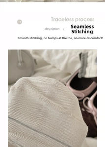 Detailed view of seamless toe stitching and knit texture on striped panda socks
