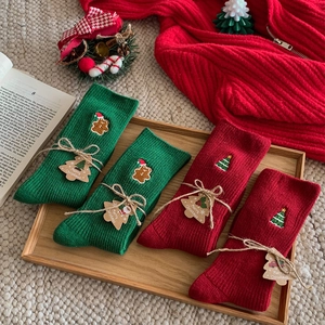Christmas embroidered crew socks set in dark green and red with festive gift tags