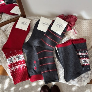 Cozy Fair Isle grey and red knit mid-calf socks with floral lace and stripe patterns