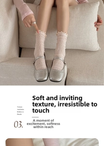 Detail of vintage hollow-out lace socks with wavy edges and breathable mesh pattern