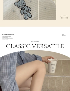 Detailed view of combed cotton women socks with cute bear embroidery and ruffles