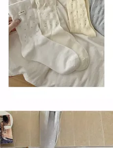 Detail of Korean style pointelle mid-calf cotton socks with I dig you label design