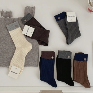 Set of contrast color knit crew socks with decorative buttons and ribbed texture