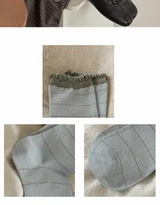Detail view of light blue striped socks with grey ruffled cuffs and knit cotton texture