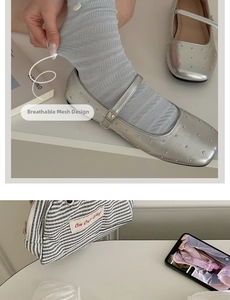 Detail of light blue mesh socks with breathable hollow pattern and silver Mary Jane shoes
