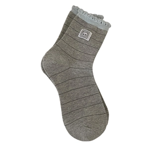 Japanese style grey striped crew socks with blue ruffle trim and a cute panda patch