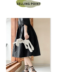 Close-up of cute white Lolita socks with black bear prints and sheer glass silk fabric