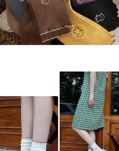 Detailed knit texture and cute dog embroidery on ruffled cuff cotton socks