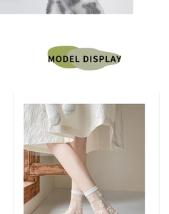 Detail of white glass silk crew socks featuring cute teddy bear patterns and ribbed cuffs