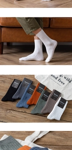 Close-up of multicolored ribbed cotton socks showing premium knit texture and diverse colors