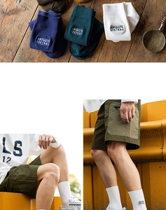 Detailed view of ribbed cotton crew socks with vintage patch and street style styling