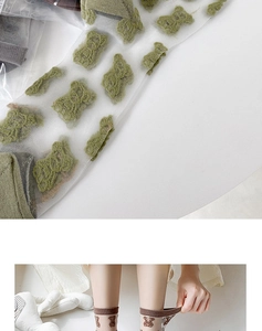 Detail of cute bear pattern on sheer mesh socks with ribbed cuffs for a girlie look