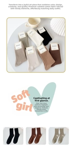 Close-up of ribbed texture and vertical stripes on soft combed cotton crew socks