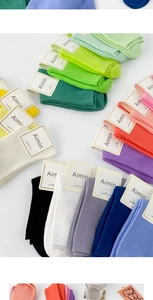 Macro shot of colorful combed cotton ribbed socks in vibrant Morandi shades