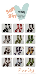 Detailed grid showing 12 color variants of thick checkerboard wool socks for winter
