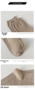 Macro view of khaki cotton waffle knit socks showing elastic cuffs and reinforced heel