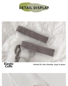 Detail display of white translucent mesh socks with elastic ribbed cuffs for comfort
