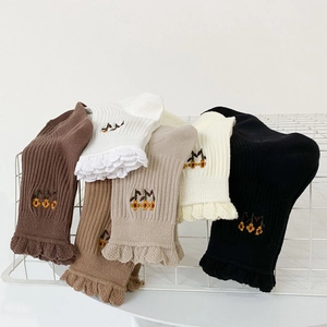 Five-pack of vintage knit crew socks with ruffled edges and small floral embroidery