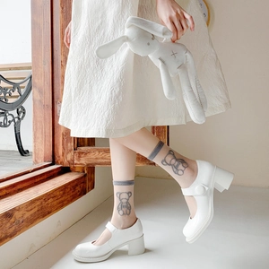 Japanese Lolita style white platform Mary Jane shoes with thick heels and shiny patent leather