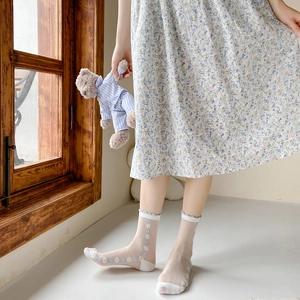 Japanese style sheer mesh floral socks with light blue embroidery and wavy cuffs