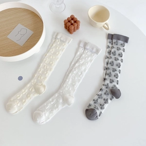 Lolita style knee high socks with cherry patterns in white and grey colors