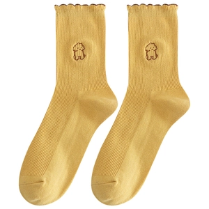 Ginger yellow cotton crew socks with puppy embroidery and ruffled wave edges
