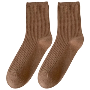 Brown waffle-knit cotton crew socks for women featuring ribbed cuffs and a vintage design