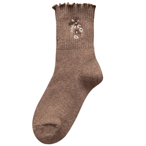 Brown wool crew socks with ruffled edges and white floral embroidery for women