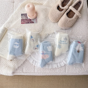 Cozy blue snowman theme winter fuzzy socks set of five with cute cartoon patterns