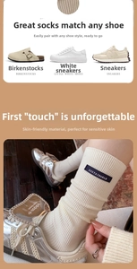Detail of ribbed knit crew socks in cream white with a sustainable fabric label