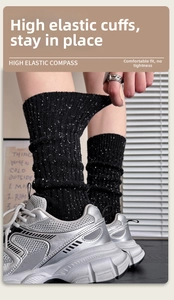 Detail of high-elasticity ribbed cuff on wool blend crew socks with speckled dot pattern