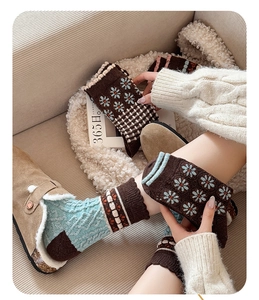 Close-up of vintage floral wool socks with thick knit texture for autumn and winter warmth